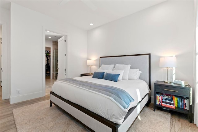 bedroom with light hardwood / wood-style floors