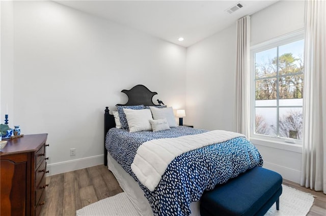 bedroom with light wood-type flooring