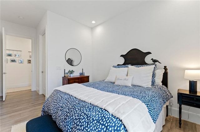 bedroom featuring light hardwood / wood-style floors