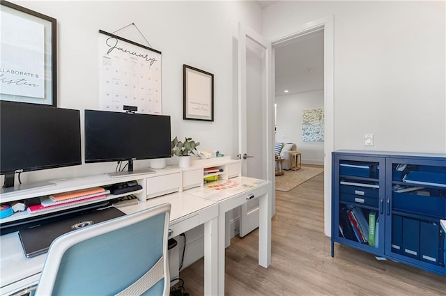 home office featuring light wood-type flooring