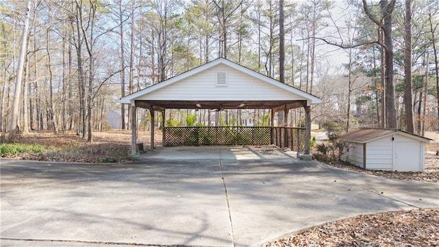 exterior space featuring a carport and a shed