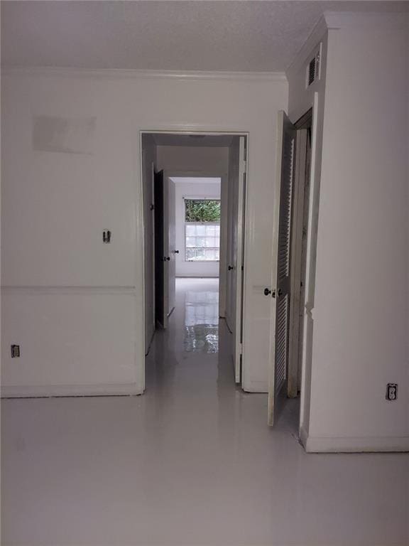 2968 Parc Lorraine, Lithonia, GA 30038 - hallway featuring crown molding and concrete floors