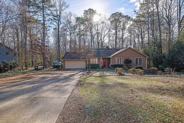 single story home featuring a garage