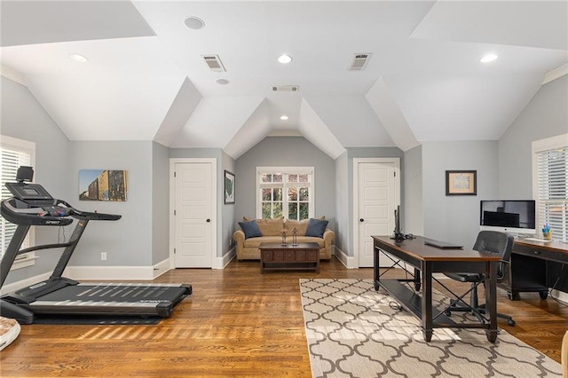 office area featuring hardwood / wood-style floors and vaulted ceiling