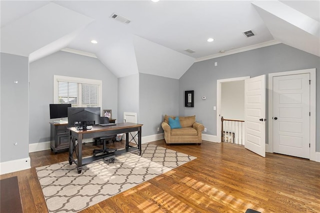 office with ornamental molding, lofted ceiling, and hardwood / wood-style flooring