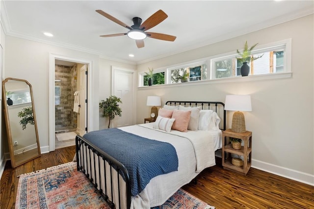 bedroom featuring ensuite bathroom, ceiling fan, crown molding, and dark wood-type flooring