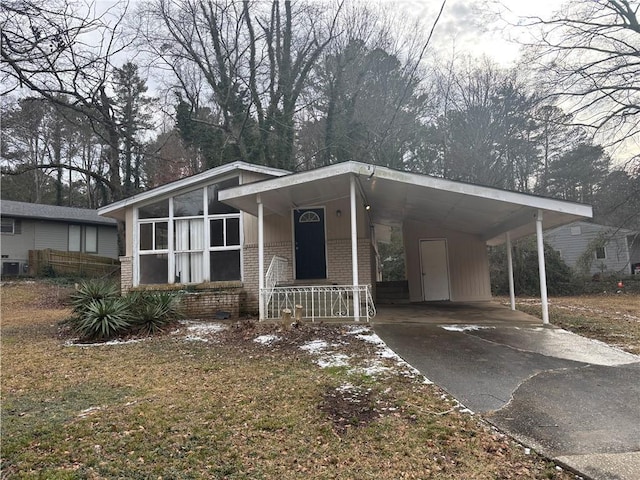 manufactured / mobile home with a carport