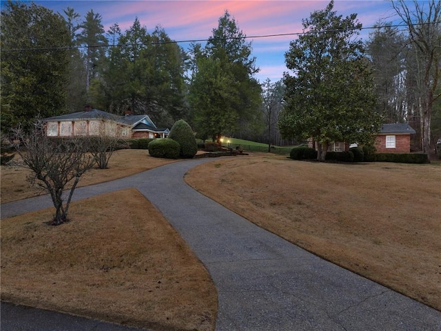 exterior space with curved driveway