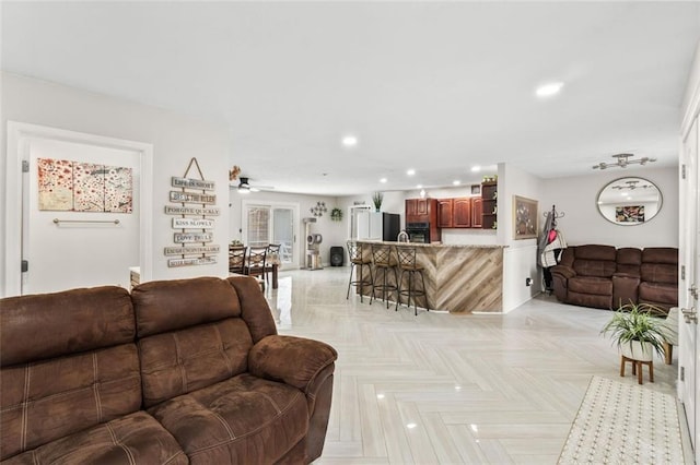 living room featuring recessed lighting