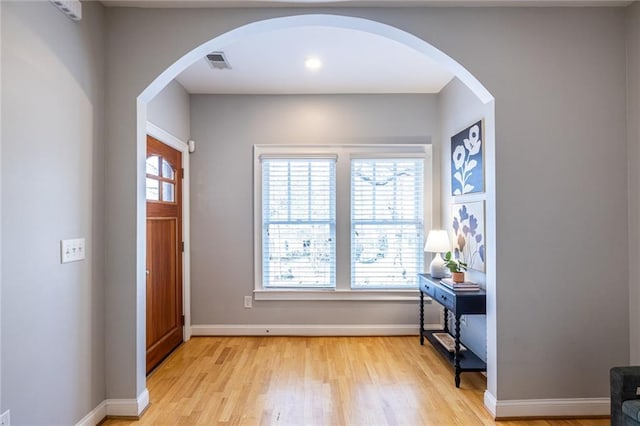 foyer with light wood-type flooring