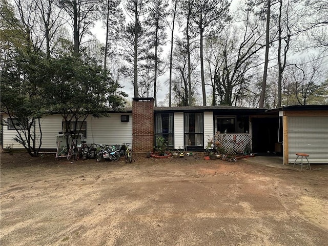 view of front of home with a chimney