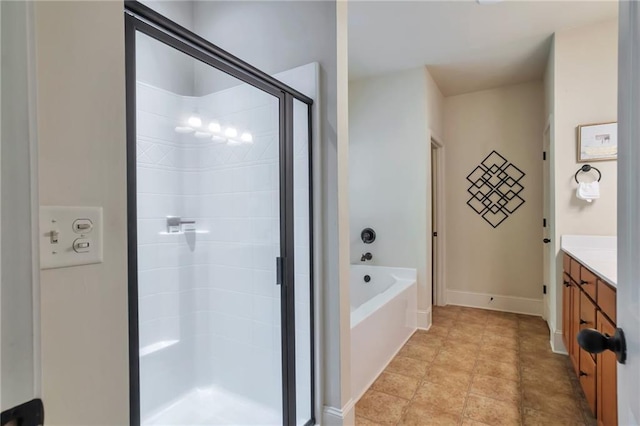 30 Lismore Way, Newnan, GA 30263 - full bath featuring a stall shower, vanity, a garden tub, and baseboards