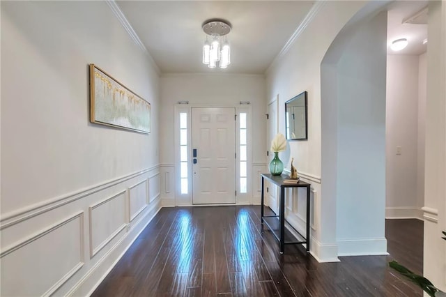 30 Lismore Way, Newnan, GA 30263 - foyer with arched walkways, hardwood / wood-style floors, ornamental molding, a decorative wall, and wainscoting