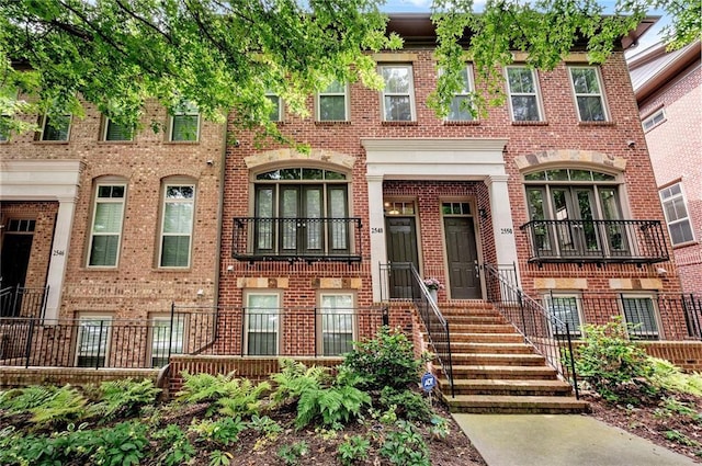 view of front of house with brick siding