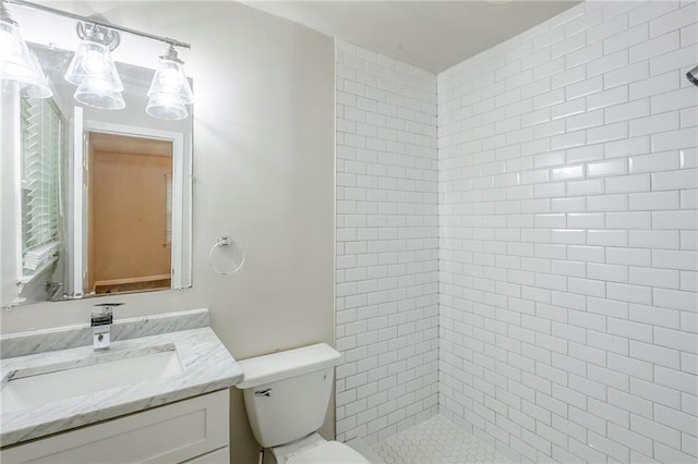 3735 Boulder Park Dr SW, Atlanta, GA 30331 - bathroom featuring toilet, vanity, and a tile shower
