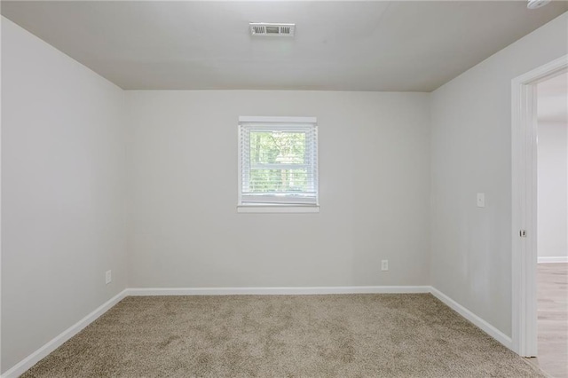 3735 Boulder Park Dr SW, Atlanta, GA 30331 - spare room featuring light colored carpet and baseboards