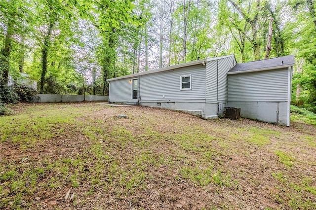 3735 Boulder Park Dr SW, Atlanta, GA 30331 - back of house with view of scattered trees and crawl space