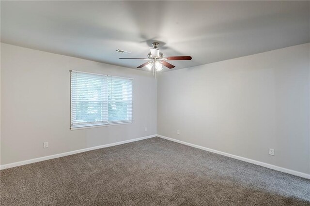 3735 Boulder Park Dr SW, Atlanta, GA 30331 - carpeted spare room with a ceiling fan and baseboards