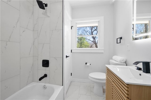 bathroom featuring baseboards, toilet, shower / tub combination, marble finish floor, and vanity