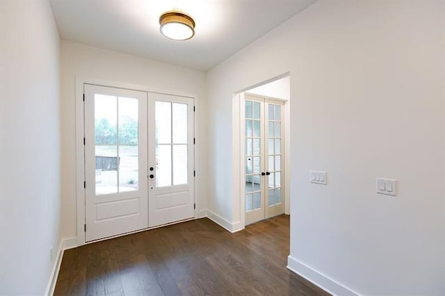 entryway with french doors and dark wood-type flooring