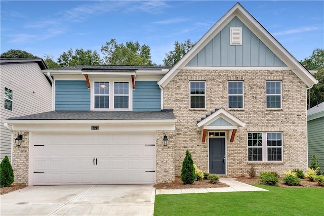 craftsman-style home with a garage and a front lawn