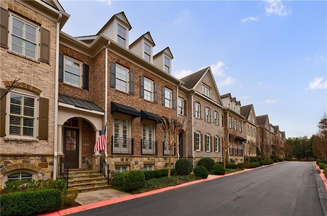 view of building exterior featuring a residential view