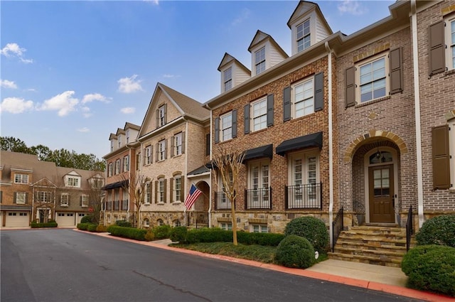 view of front of house featuring a residential view and entry steps