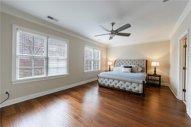 bedroom with baseboards, visible vents, dark wood-style flooring, and ornamental molding