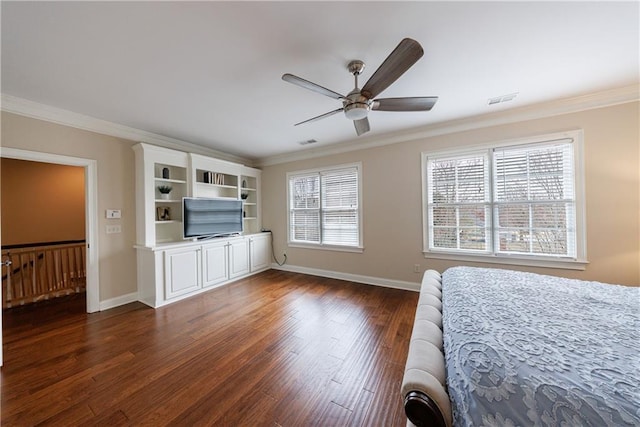 unfurnished bedroom with baseboards, ornamental molding, and dark wood-style flooring
