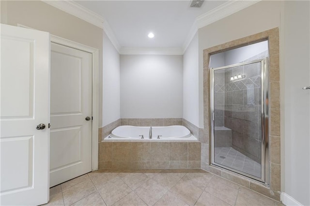 full bathroom featuring tile patterned floors, a garden tub, ornamental molding, and a shower stall