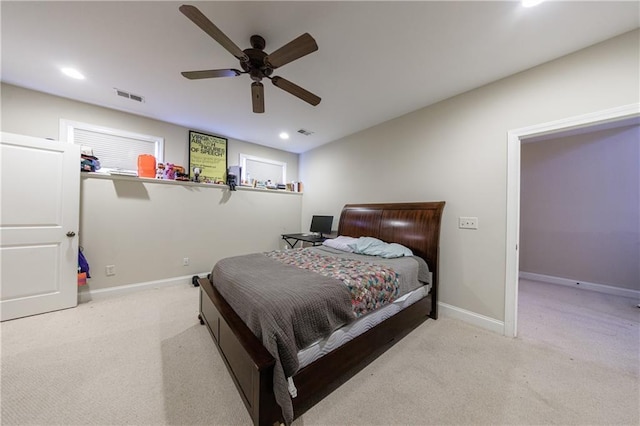 carpeted bedroom featuring recessed lighting, visible vents, baseboards, and ceiling fan