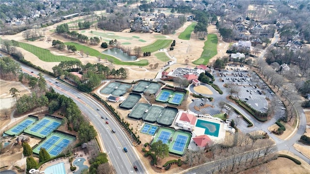 birds eye view of property with view of golf course