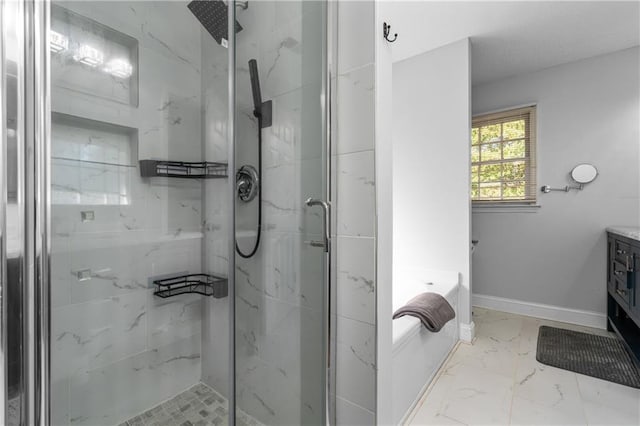 bathroom with vanity and separate shower and tub