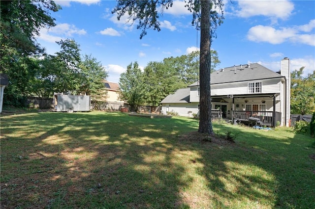 view of yard with a storage shed