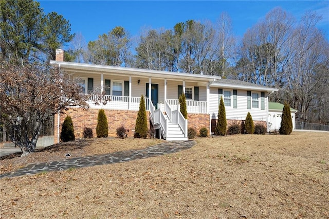 ranch-style house with a front yard and a porch