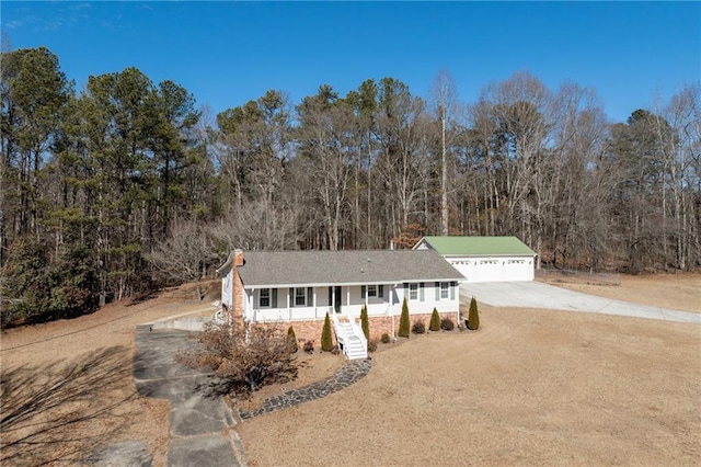 view of front of home with a garage and covered porch