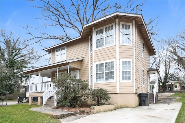 view of home's exterior featuring covered porch