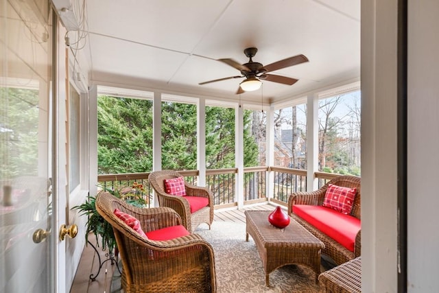 sunroom / solarium with ceiling fan