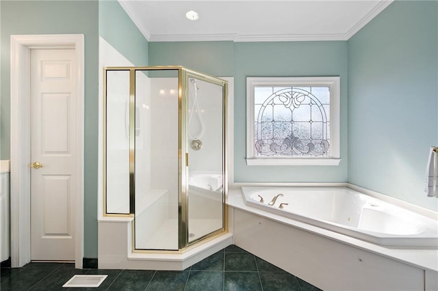 bathroom featuring visible vents, ornamental molding, tile patterned floors, a garden tub, and a shower stall