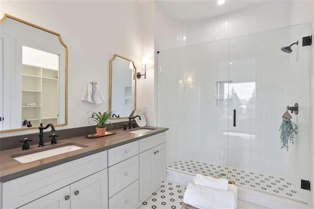 bathroom with vanity and walk in shower