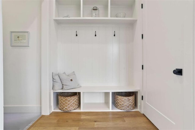 mudroom with wood-type flooring