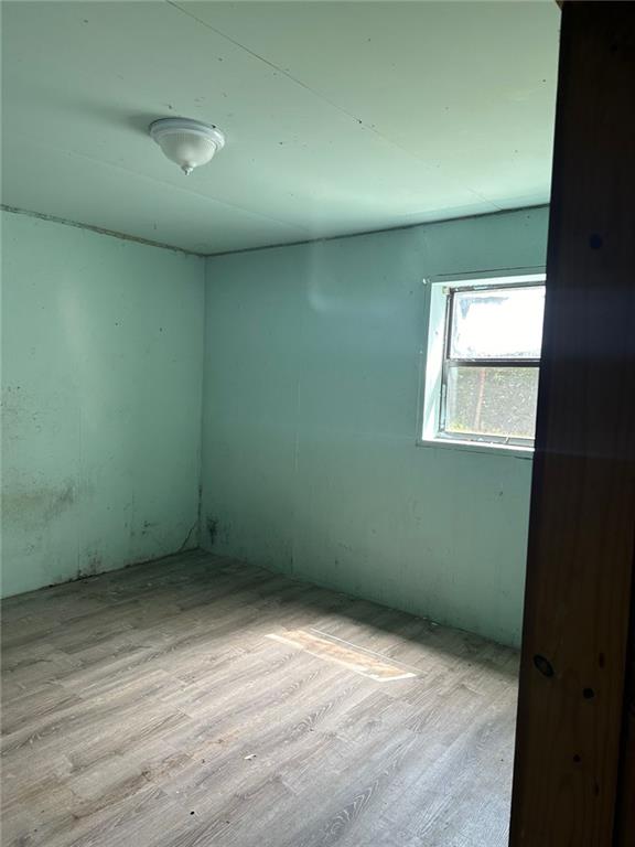134 Cicero Trl, Dawsonville, GA 30534 - unfurnished room with wood finished floors