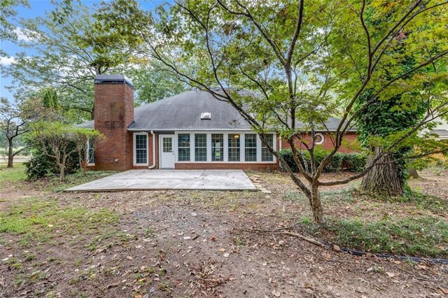 rear view of house with a patio area