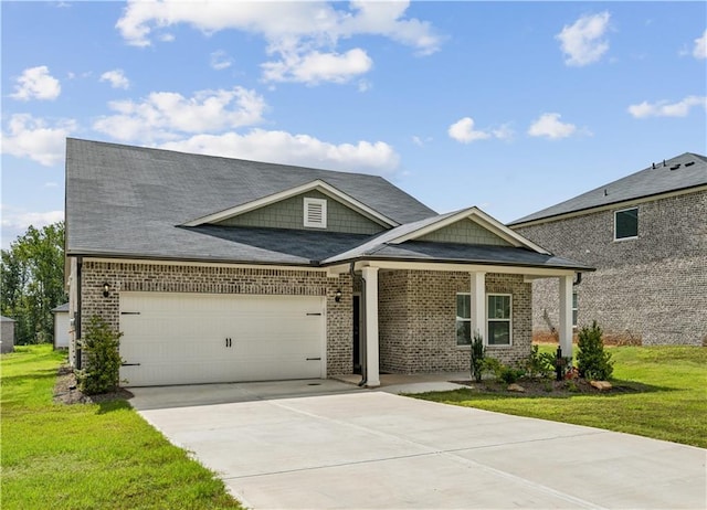 view of front of home with a porch and a front lawn