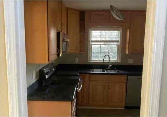 kitchen with sink and stainless steel appliances