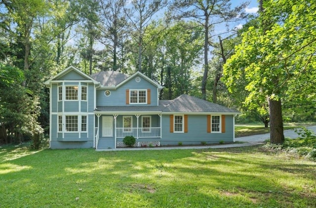 800 Post Road Cir, Stone Mountain, GA 30088 - view of front of property featuring covered porch, a front yard, and view of scattered trees