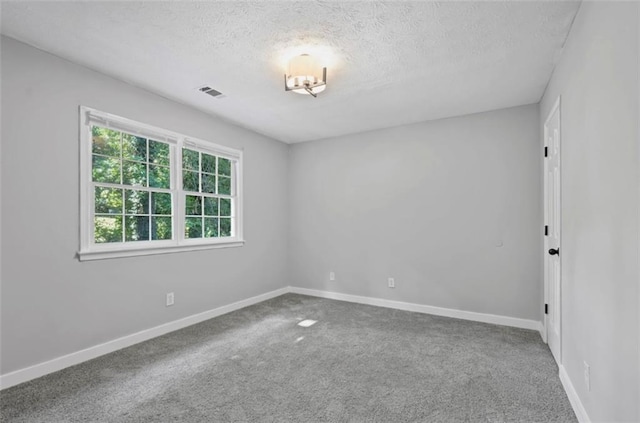 800 Post Road Cir, Stone Mountain, GA 30088 - carpeted empty room with a textured ceiling and baseboards