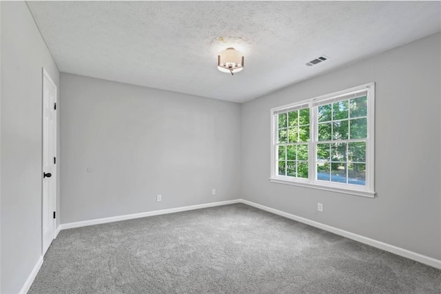 800 Post Road Cir, Stone Mountain, GA 30088 - carpeted spare room featuring baseboards and a textured ceiling