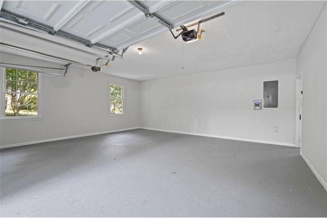 800 Post Road Cir, Stone Mountain, GA 30088 - garage featuring electric panel, baseboards, and a garage door opener