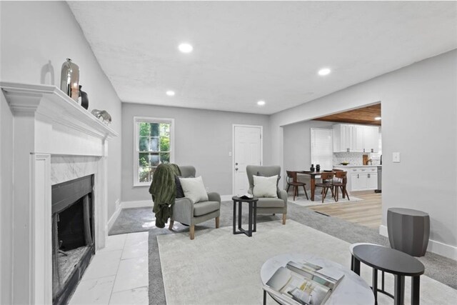 800 Post Road Cir, Stone Mountain, GA 30088 - living room with recessed lighting, baseboards, and a high end fireplace